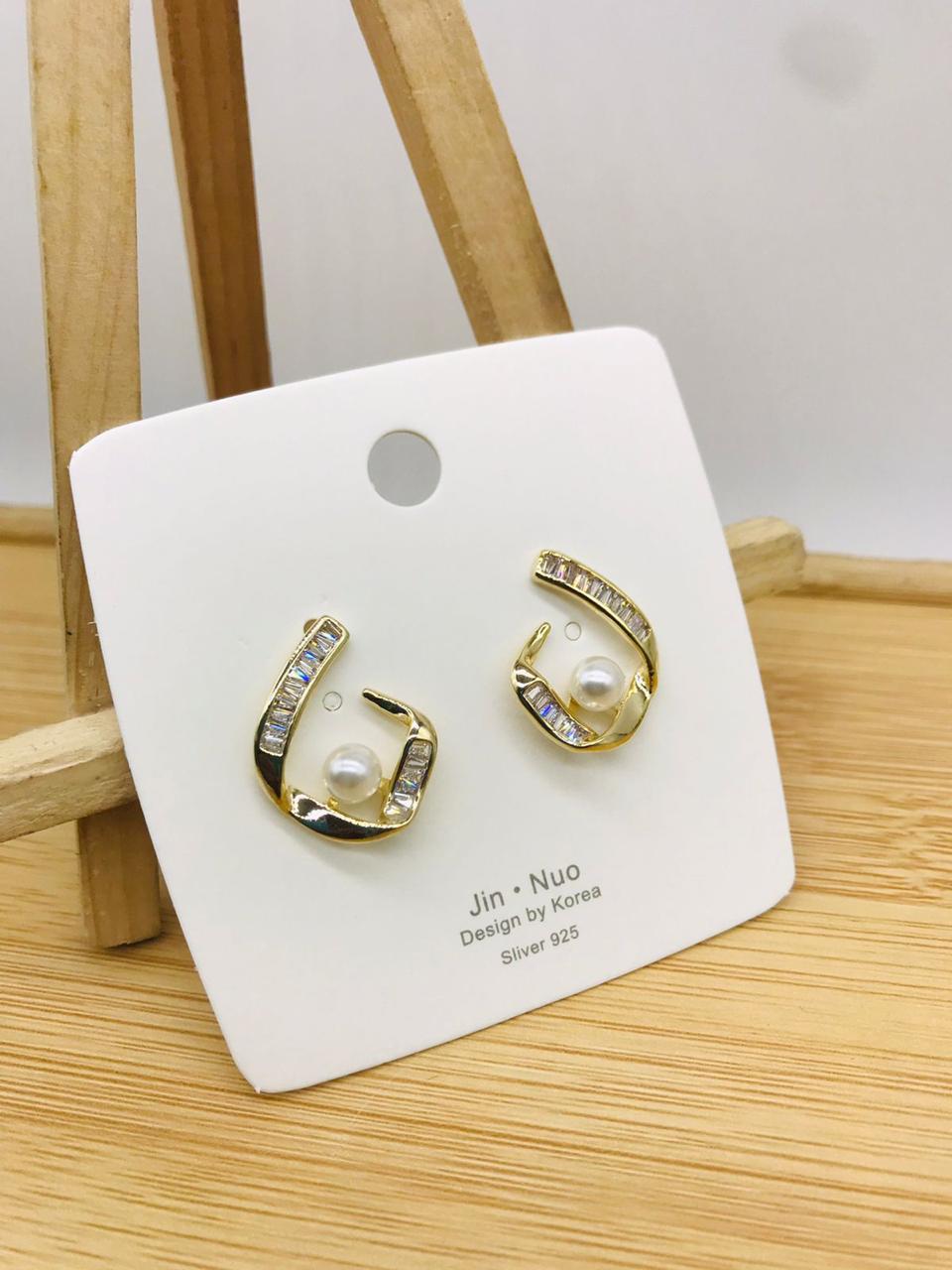 2 AD Diamond Steel And Rose Gold Party Wear Earrings Manufacturers
